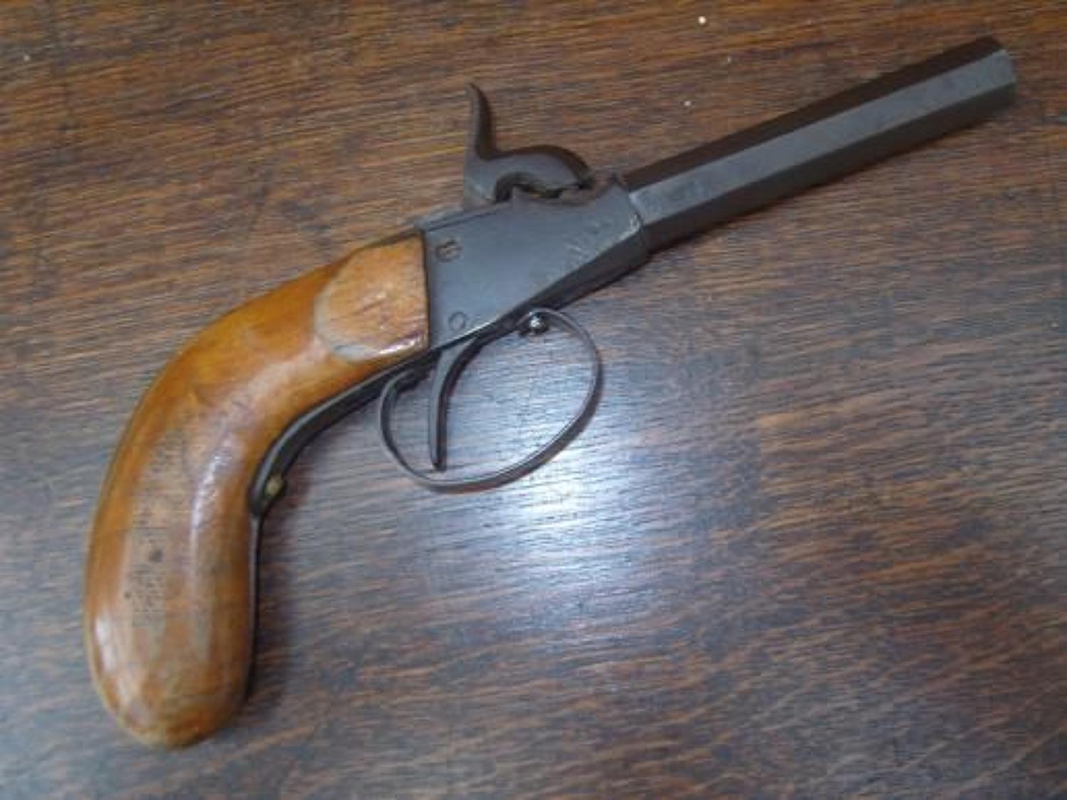 19th century percussion pocket pistol.