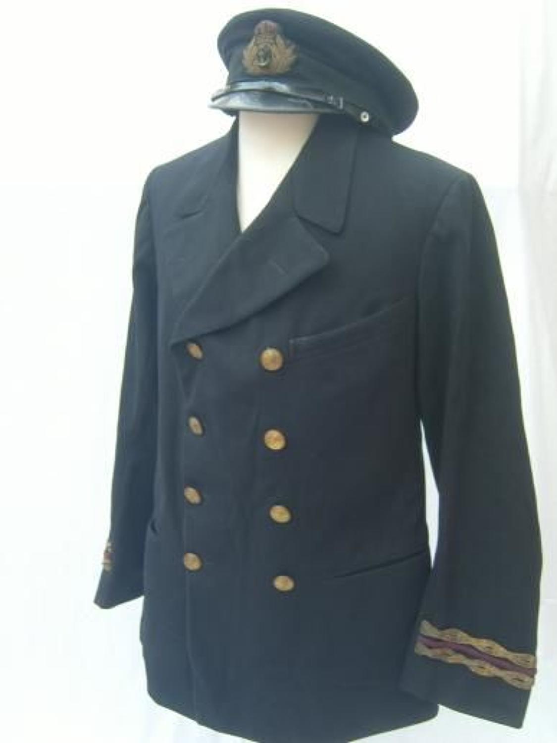 1915 DATED TUNIC & CAP TO ROYAL NAVAL RESERVE OFFICER
