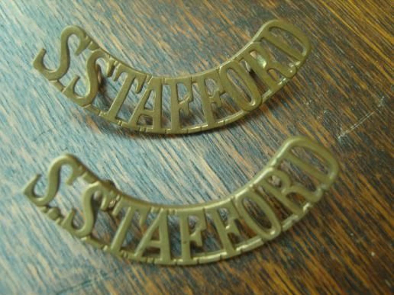 Pair of WW1 Brass shoulder titles. South Staffordshire Regiment