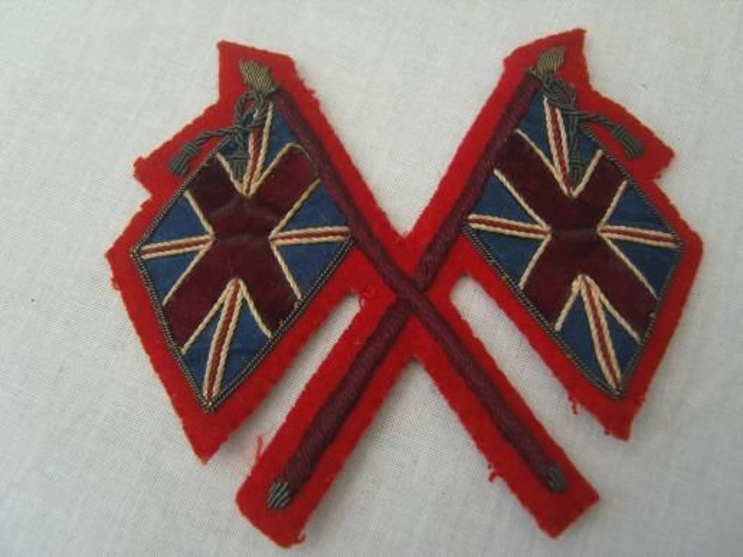Pre WW1 crossed flags recruiting sergeants arm badge.
