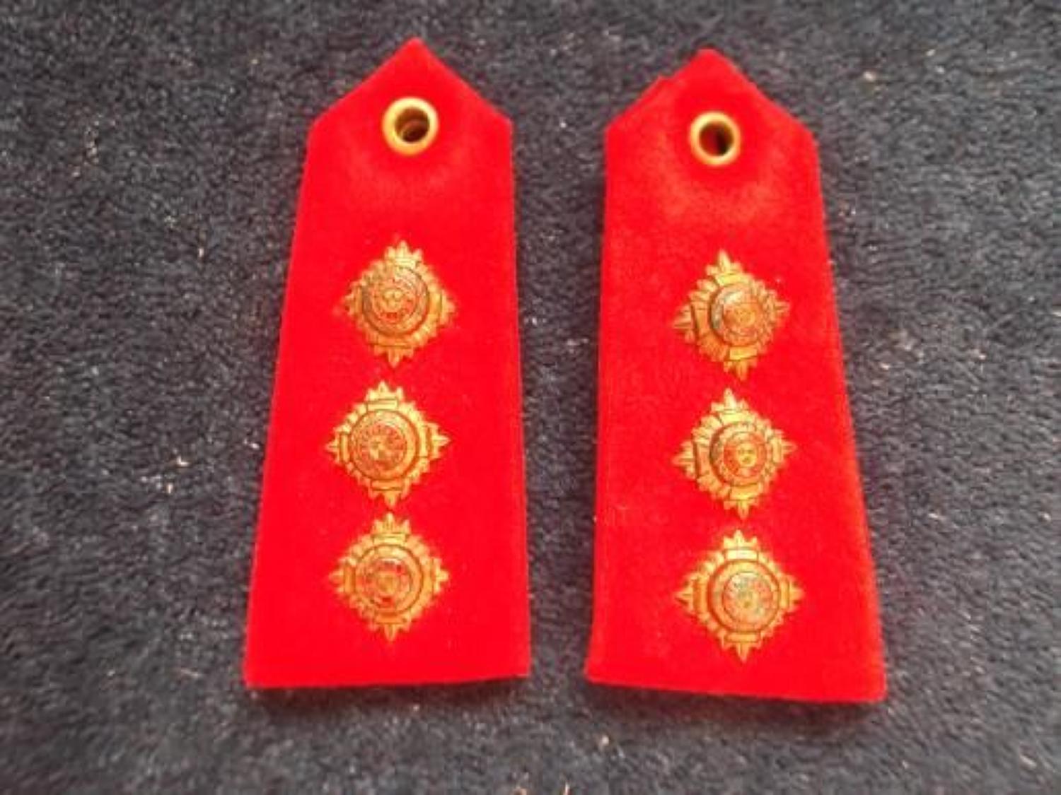 Mess Dress Shoulder Rank. Three brass pips for Captain.