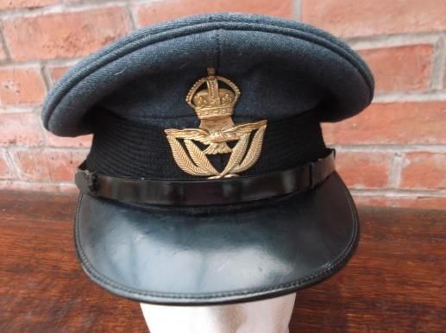 WW2 little worn Warrant Officers peak cap with brass RAF Kings Crown Badge.