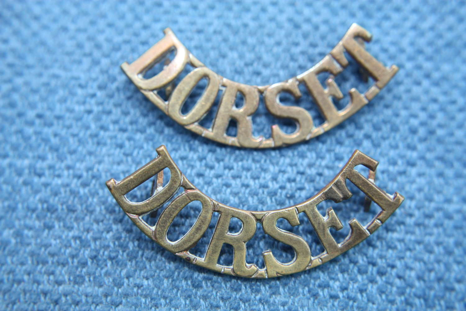 Pair matching WW1 Brass shoulder titles. Dorset Regiment :British Army