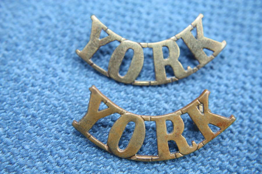 Pair matching WW1 Brass shoulder titles. North Yorkshire Regiment