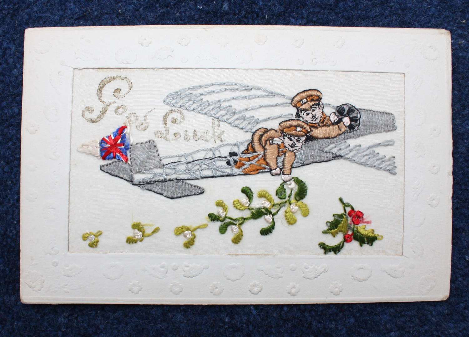 WW1 Embroidered Silk Postcard of two British Soldiers flying a Plane.