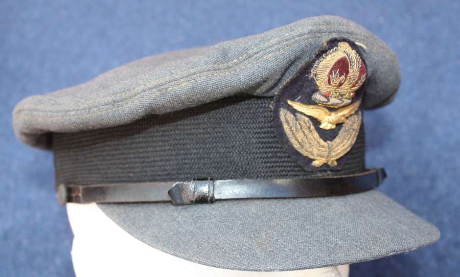WW2 RAF Officers Peaked Cap. Kings crown badge & leather chin strap.