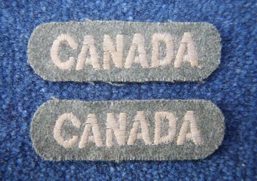 WW1 Canada Matching pair of embroidered shoulder titles.