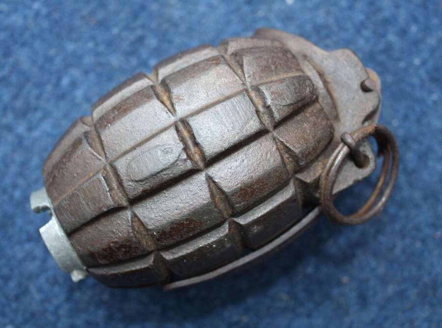 WW1 1916 dated British Army "Mills Bomb" grenade. Excellent condition.